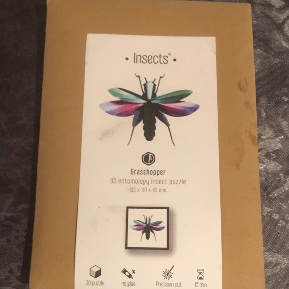 Moma Grasshopper Wall Puzzle Green, Purple, Teal, Pink, Black